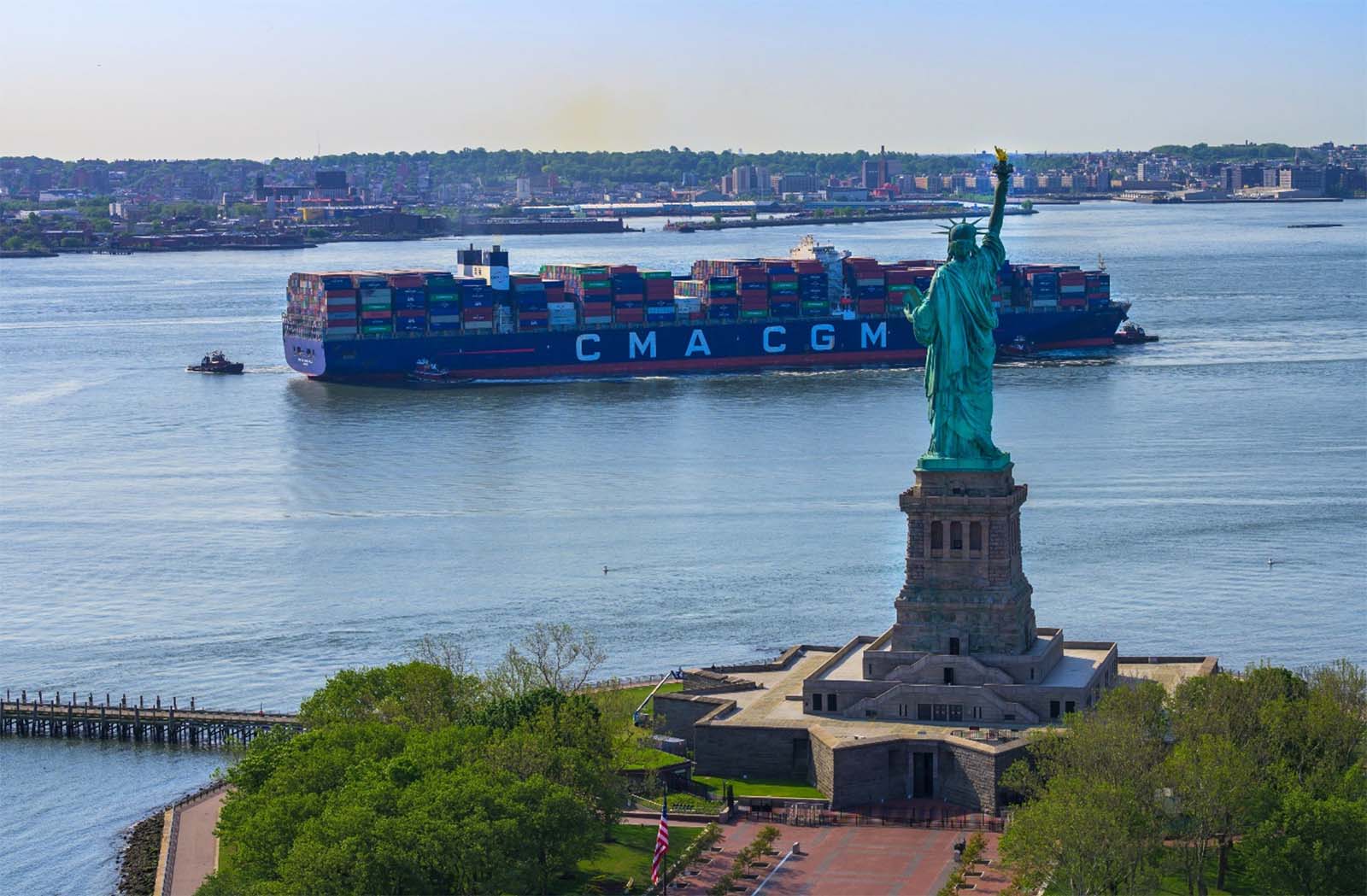 ship passing by Statue of Liberty